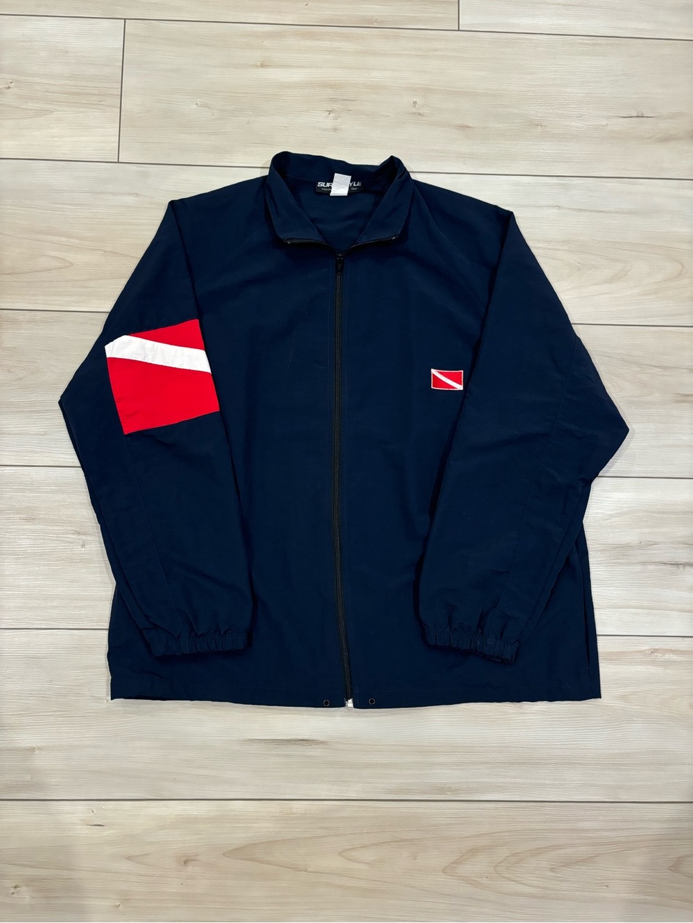 surf style vintage 90s Navy Windbreaker Jacket with Red and White Sleeve Accent